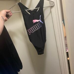 BNWOT ( tag fell off) Puma Black One Piece Size Small 6 for Girls.